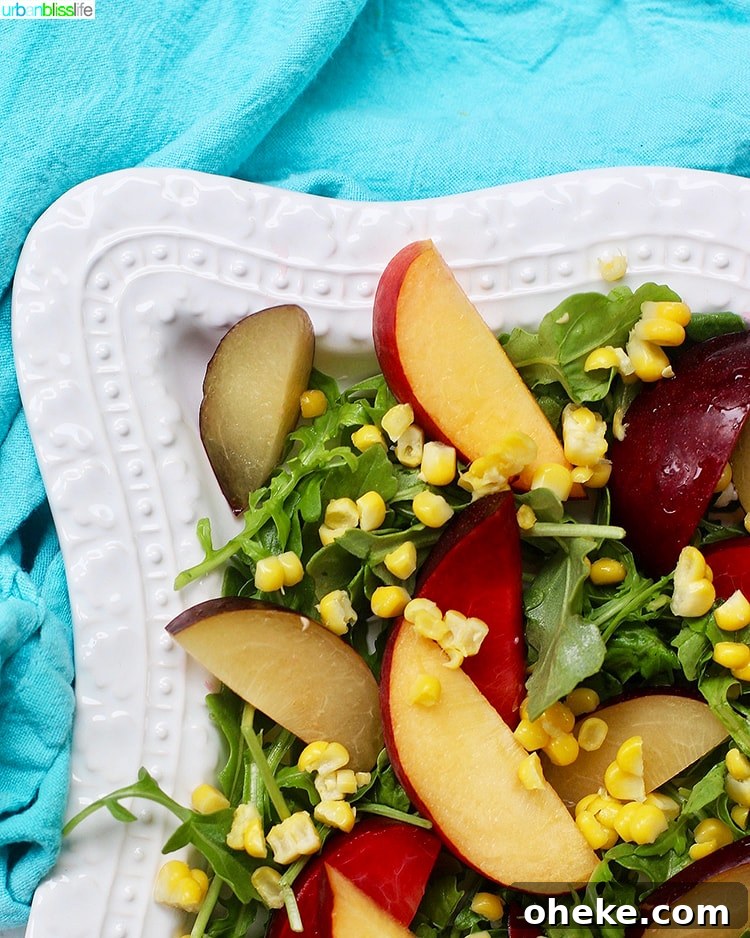 Summer Peach and Plum Salad with Honey-Lime Dressing 4 corner of Peach and Plum Summer Salad