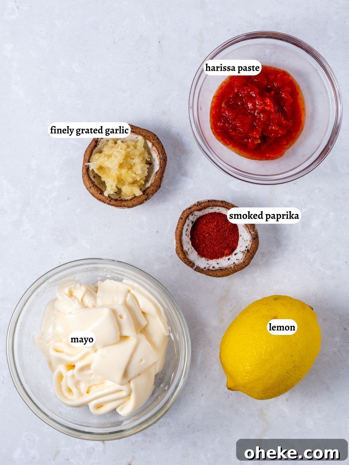 ingredients needed for the recipe: garlic, harissa, smoked paprika, lemon, mayo