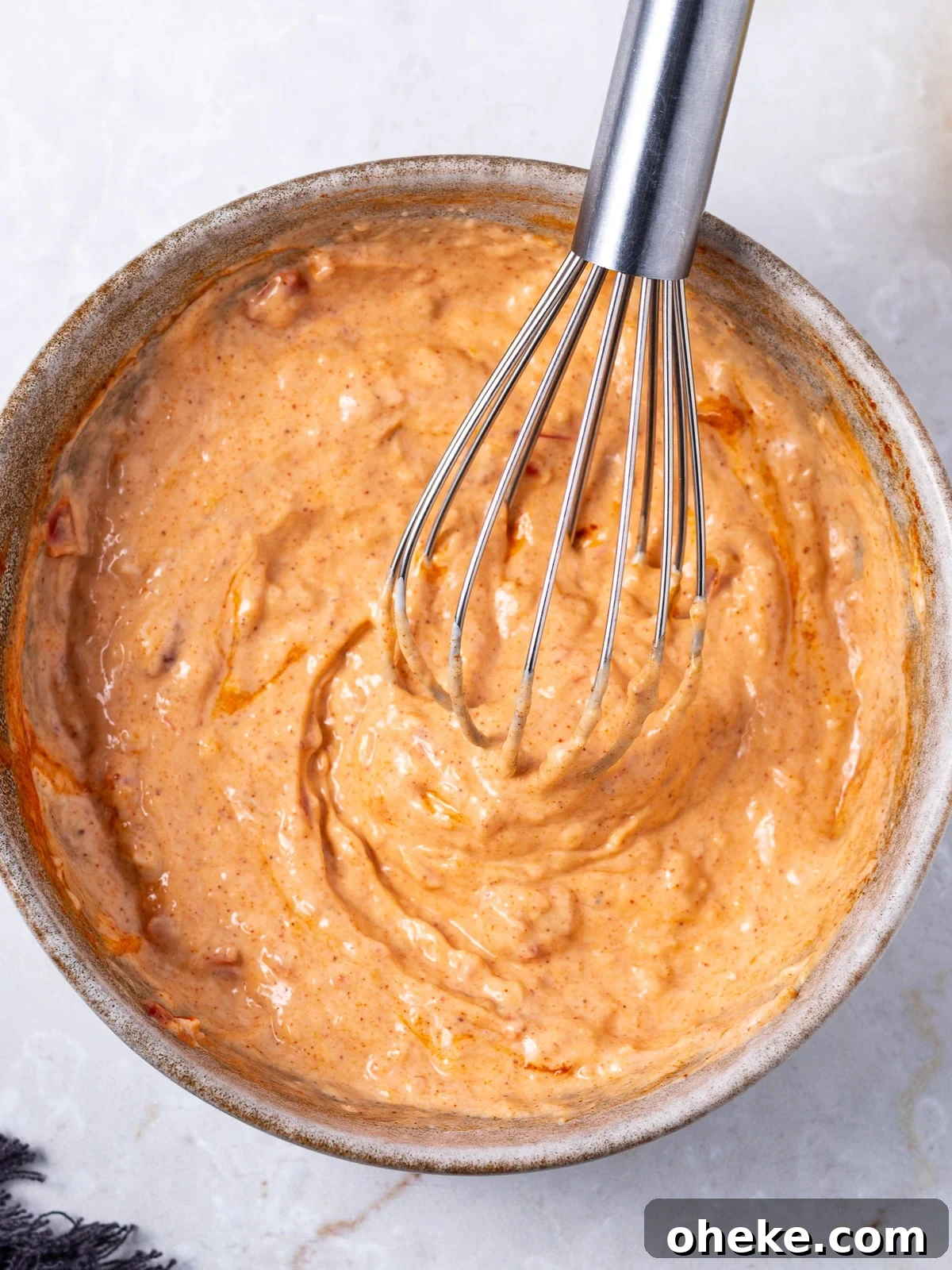 small bowl with whisked harissa mayo