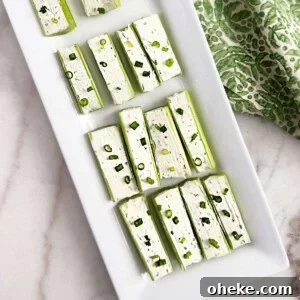 Mom’s Classic Stuffed Celery Recipe — Party Appetizer 9 stuffed celery with cream cheese topped with chives.