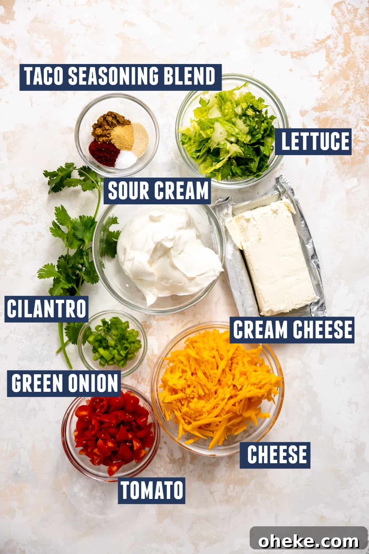 Creamy Layered Taco Dip Recipe for Parties and Game Day 3 Ingredients in taco dip.
