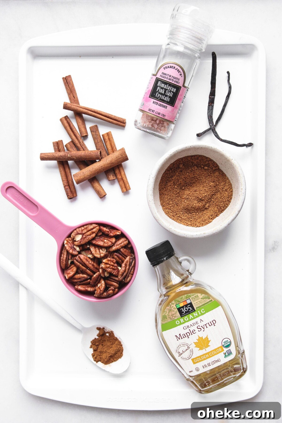 Pumpkin Spice Candied Pecans (No Butter, Vegan-Friendly) 3 recipe ingredients on a white tray