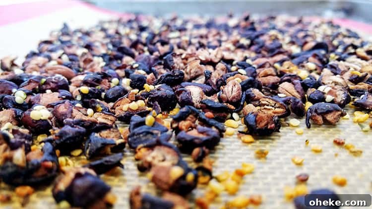 roasted black beans in a single layer on baking sheet