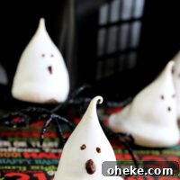 Ghost Meringues Recipe: How to Make Spooky Meringue Cookies 11 These ghost meringues are finish with the perfect scary background for Halloween!