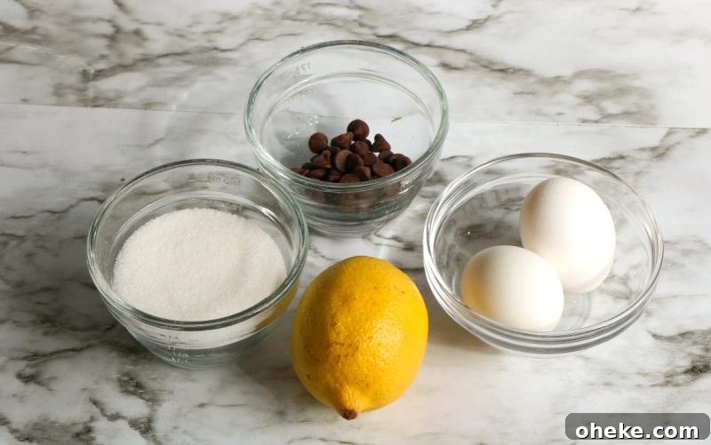Ghost Meringues Recipe: How to Make Spooky Meringue Cookies 4 Ingredients are gathered ready to make the meringue ghosts.