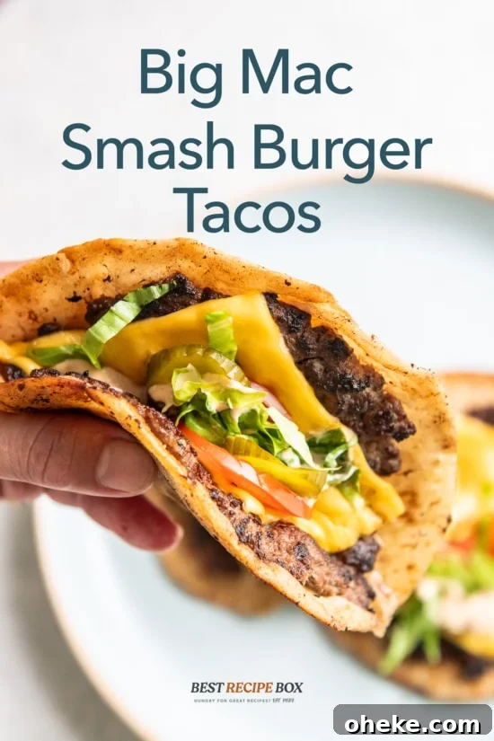 holding big mac smash burger taco 