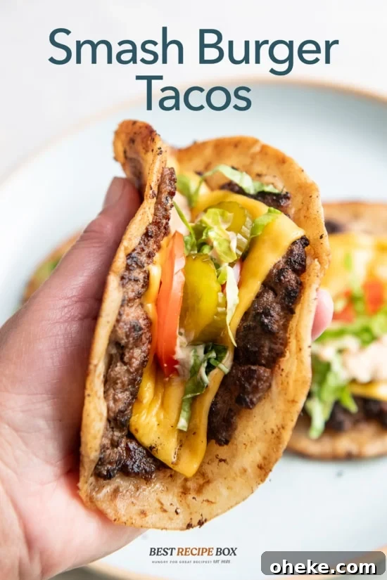 holding smash burger taco 