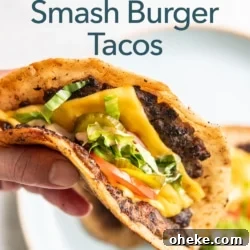 holding big mac smash burger taco