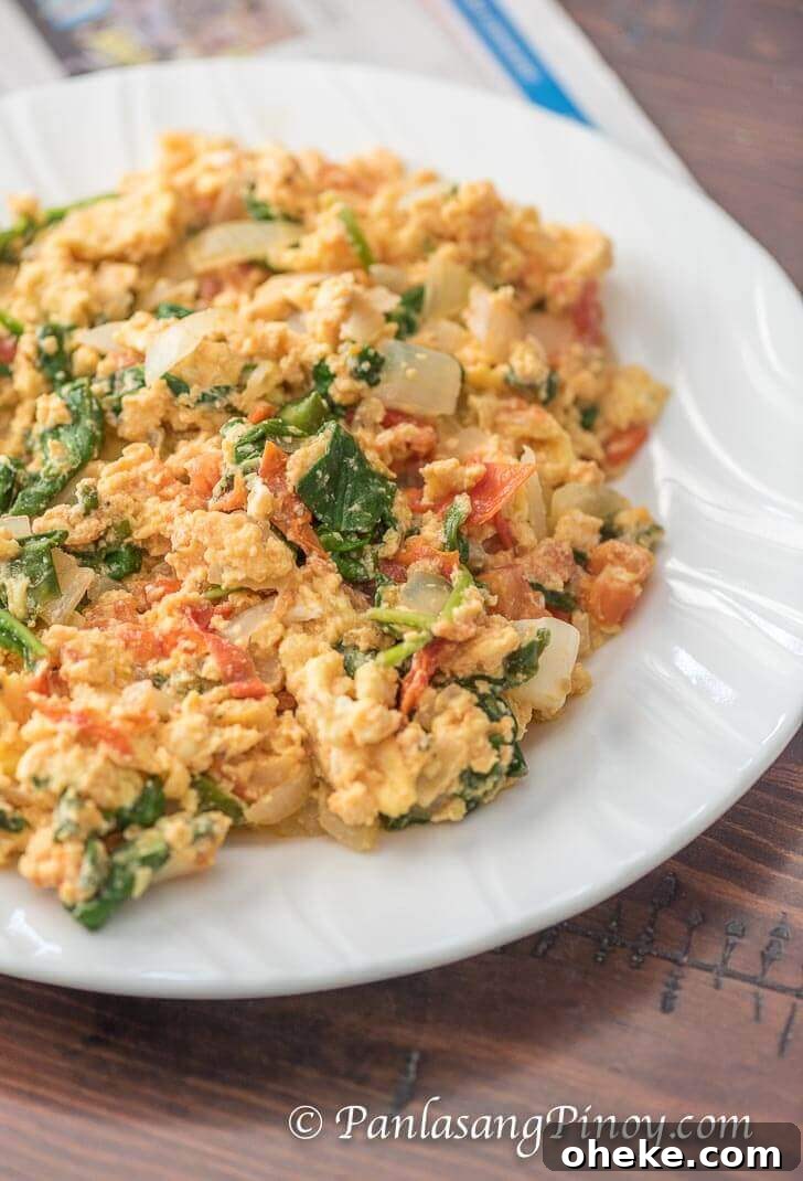 Scrambled Eggs with Tomato, Onion, and Spinach