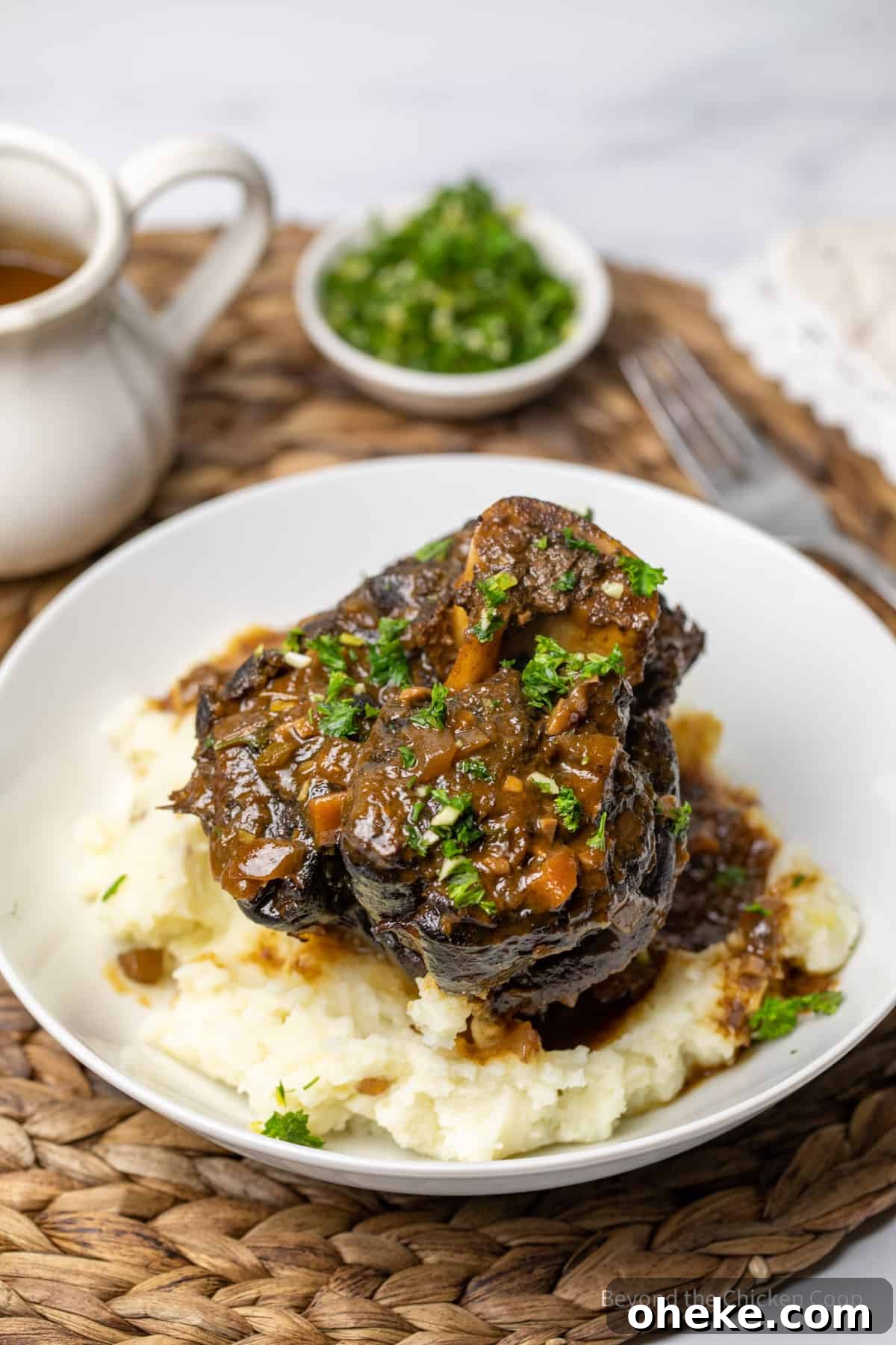 Osso Buco on a plate with mashed potatoes. 