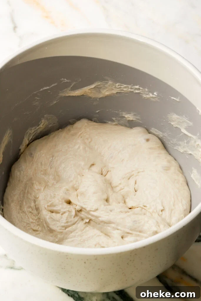 pull all the edges of the dough away from the bowl