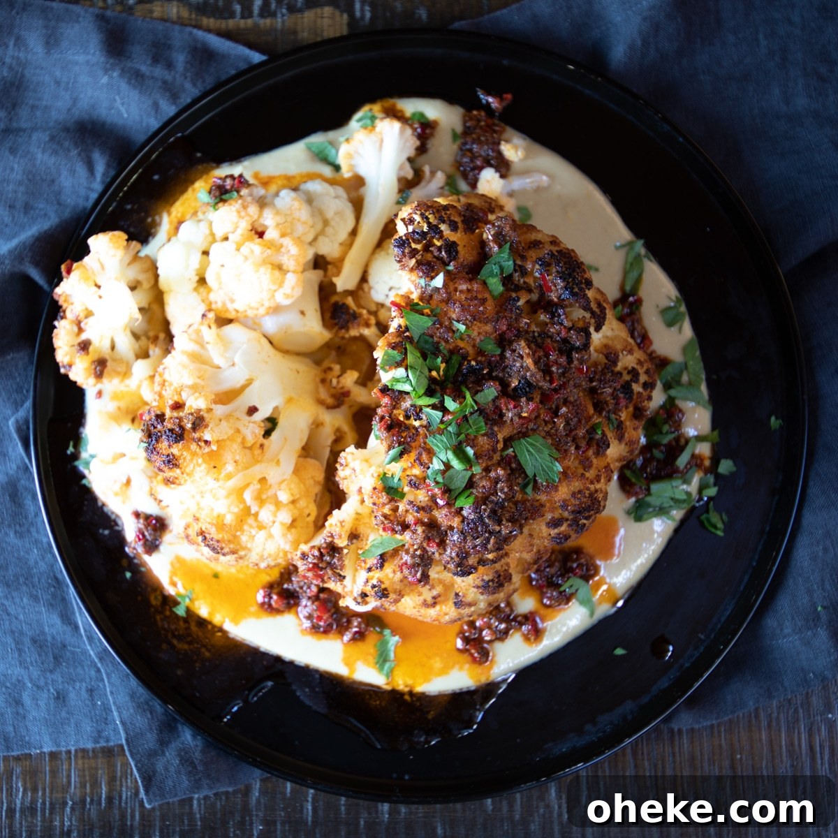 September Week 2 Vegetarian Meal Plan: Fresh Recipes & Grocery List 3 Whole roasted cauliflower, with tahini sauce and smokey paprika dressing.