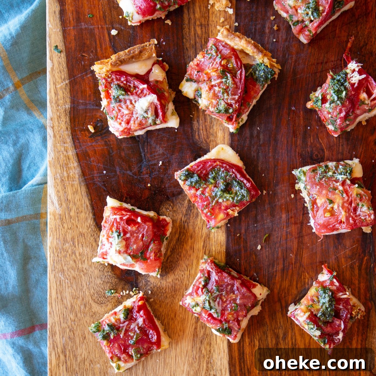 September Week 2 Vegetarian Meal Plan: Fresh Recipes & Grocery List 9 Hand held appetizer pieces of a tomato tart.