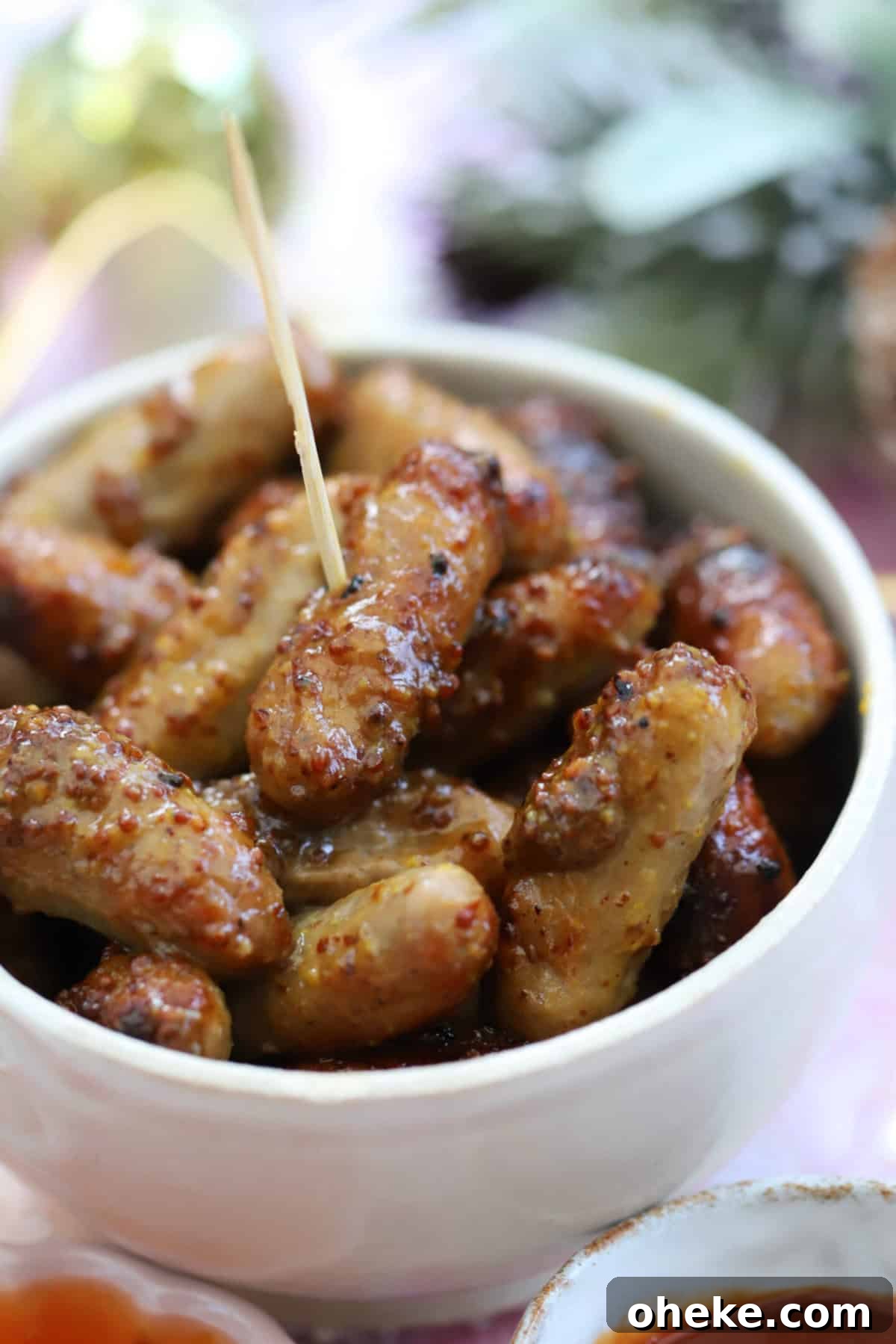 Honey Mustard Cocktail Sausages Recipe for Parties 3 A bowl of honey and mustard cocktail sausages.