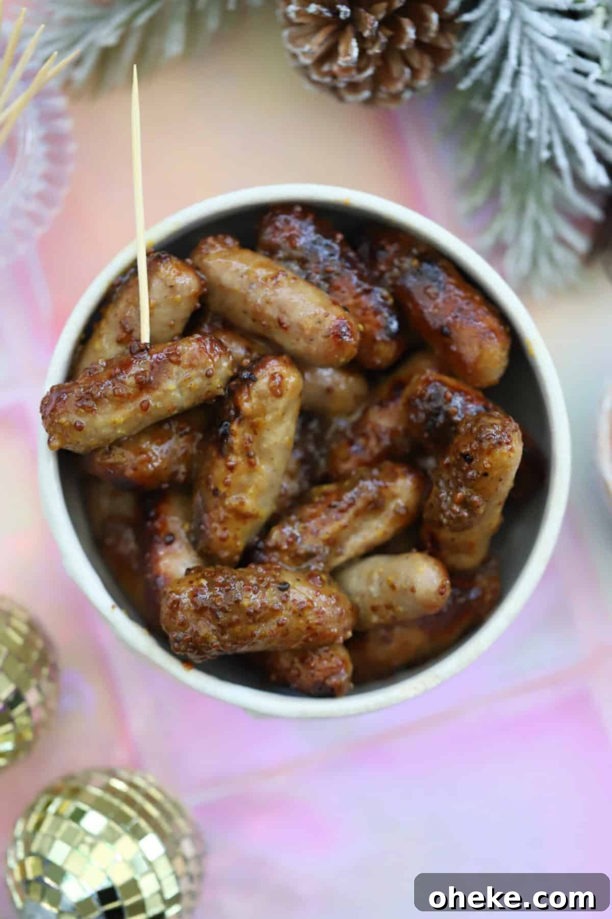 Honey Mustard Cocktail Sausages Recipe for Parties 7 A bowl of honey and mustard cocktail sausages.
