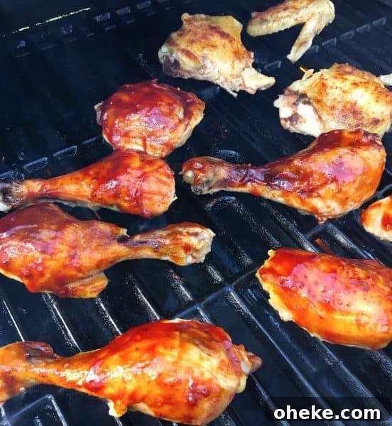 Cherry Dr Pepper Glazed Grilled Chicken Recipe 10 Chicken with BBQ sauce on the grill