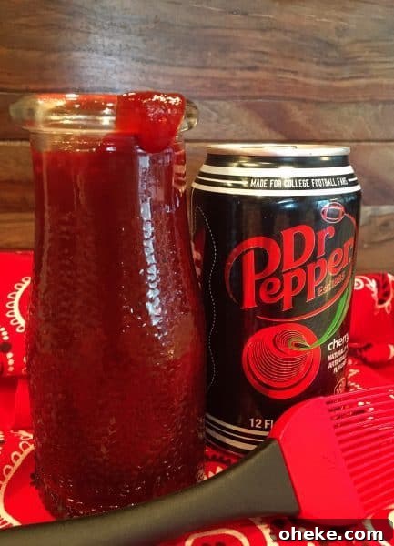Cherry Dr Pepper Glazed Grilled Chicken Recipe 9 Cherry Dr Pepper BBQ Sauce in a jar with a can of Dr Pepper