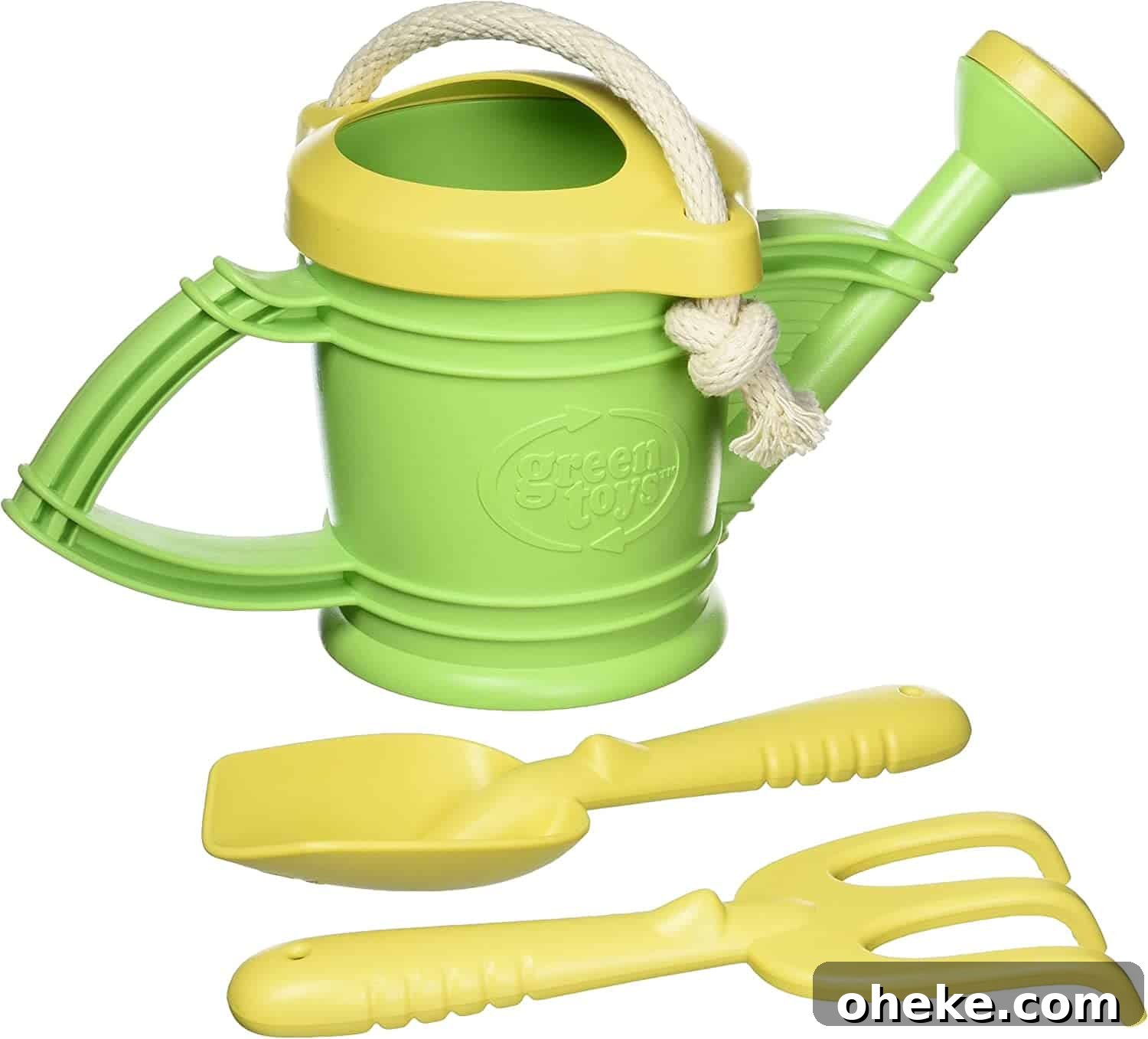 a Green Toys watering can and shovel set