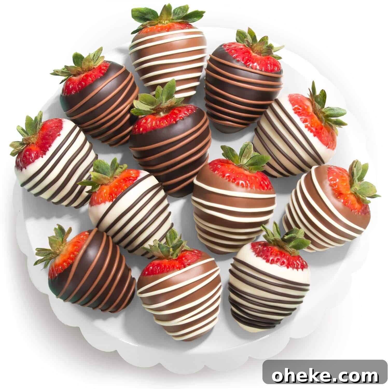 a plate of chocolate covered strawberries 