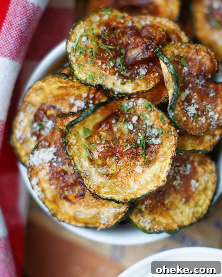 Crispy fried zucchini chips with no breading are a delicious way to use and prepare excess zucchini.