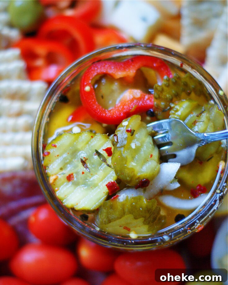 Sweet & spicy bread and butter pickles are a quick refrigerator pickle with a semi-homemade recipe that requires no canning.