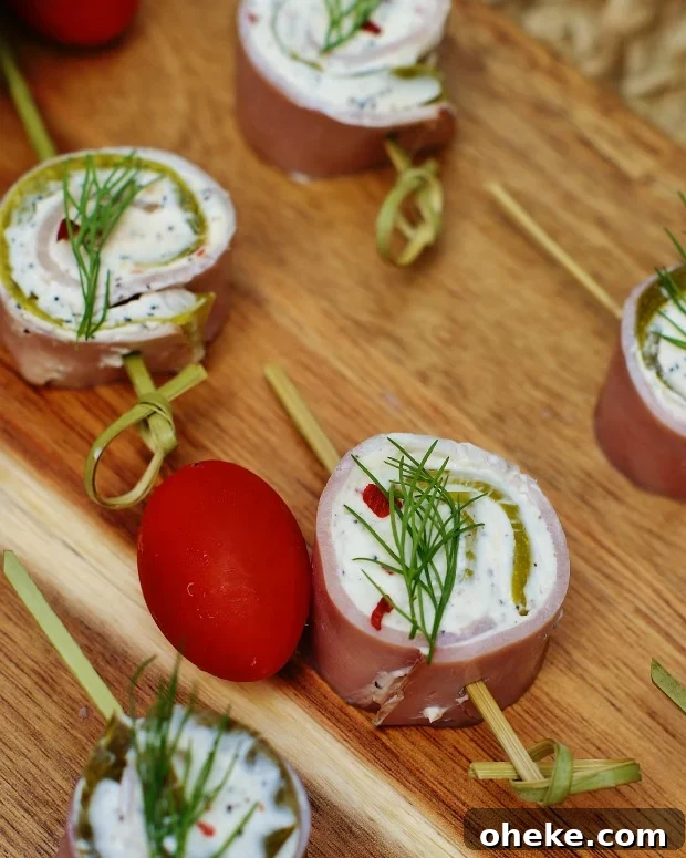 Ham & dill pickle pinwheels on a serving plate