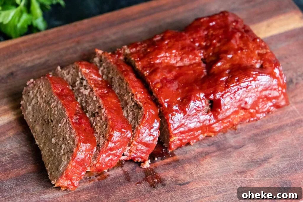Smoked meatloaf on a cutting board.