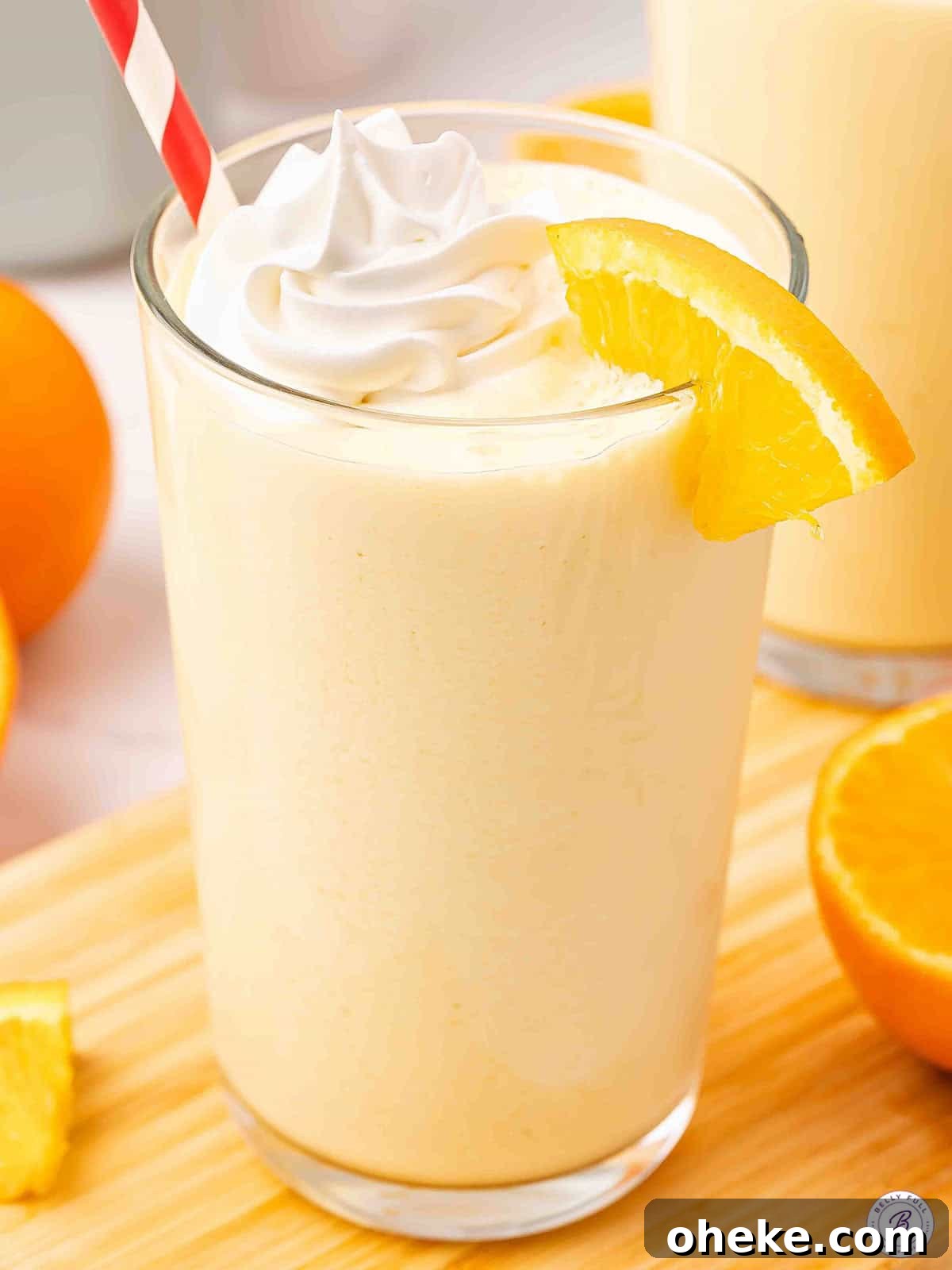 How to Make a Classic Orange Julius at Home 2 Orange Julius with whipped cream and straw