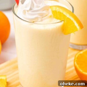 How to Make a Classic Orange Julius at Home 3 Orange Julius with whipped cream and straw