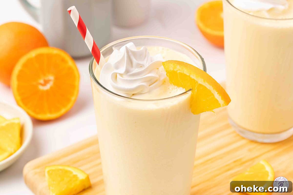 How to Make a Classic Orange Julius at Home 7 Orange Julius with whipped cream and straw