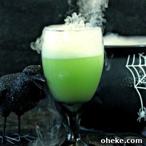 Bloody Glass Cupcakes Recipe: Spooky Jello-Filled Treats for Halloween 8 Witch's Brew Halloween Punch shown in a black cauldron.