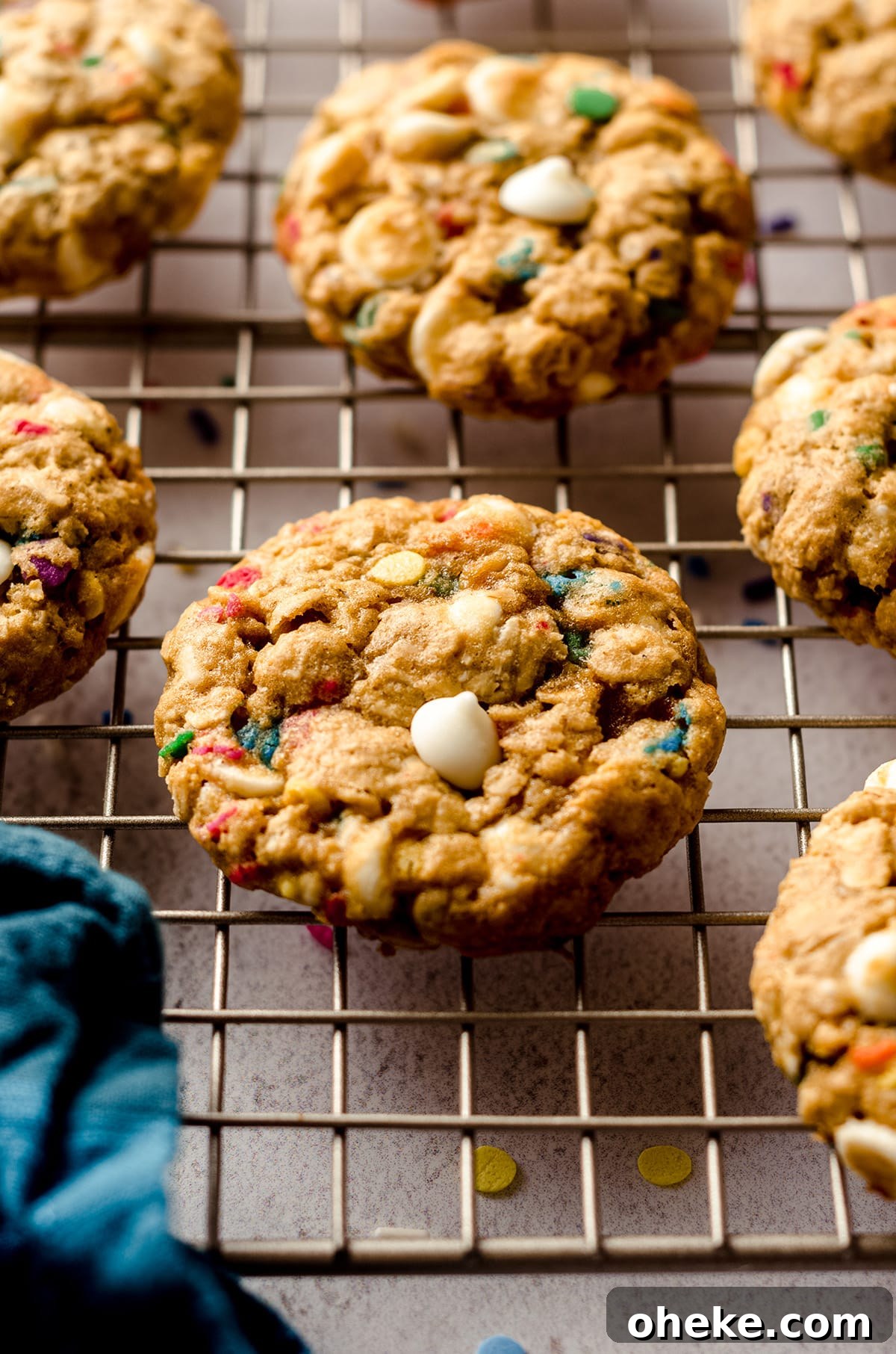 Funfetti White Chocolate Oatmeal Cookies Recipe 6 funfetti oatmeal cookies on a cooling rack