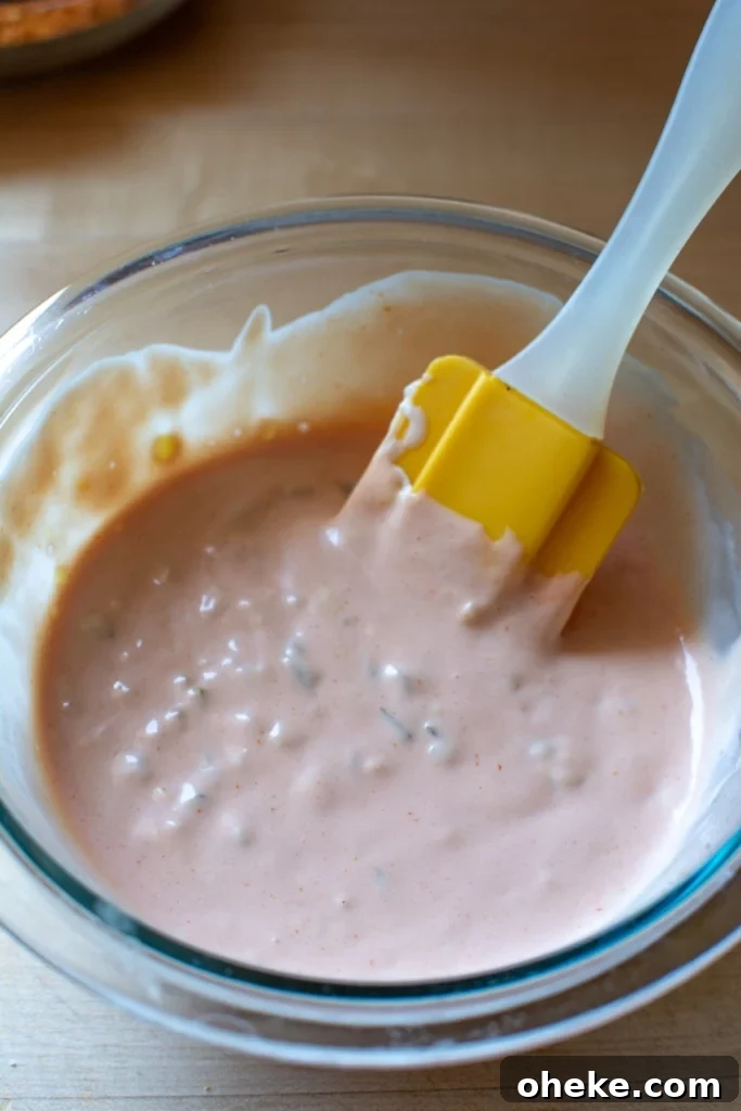 The sauce for the corn in a glass bowl