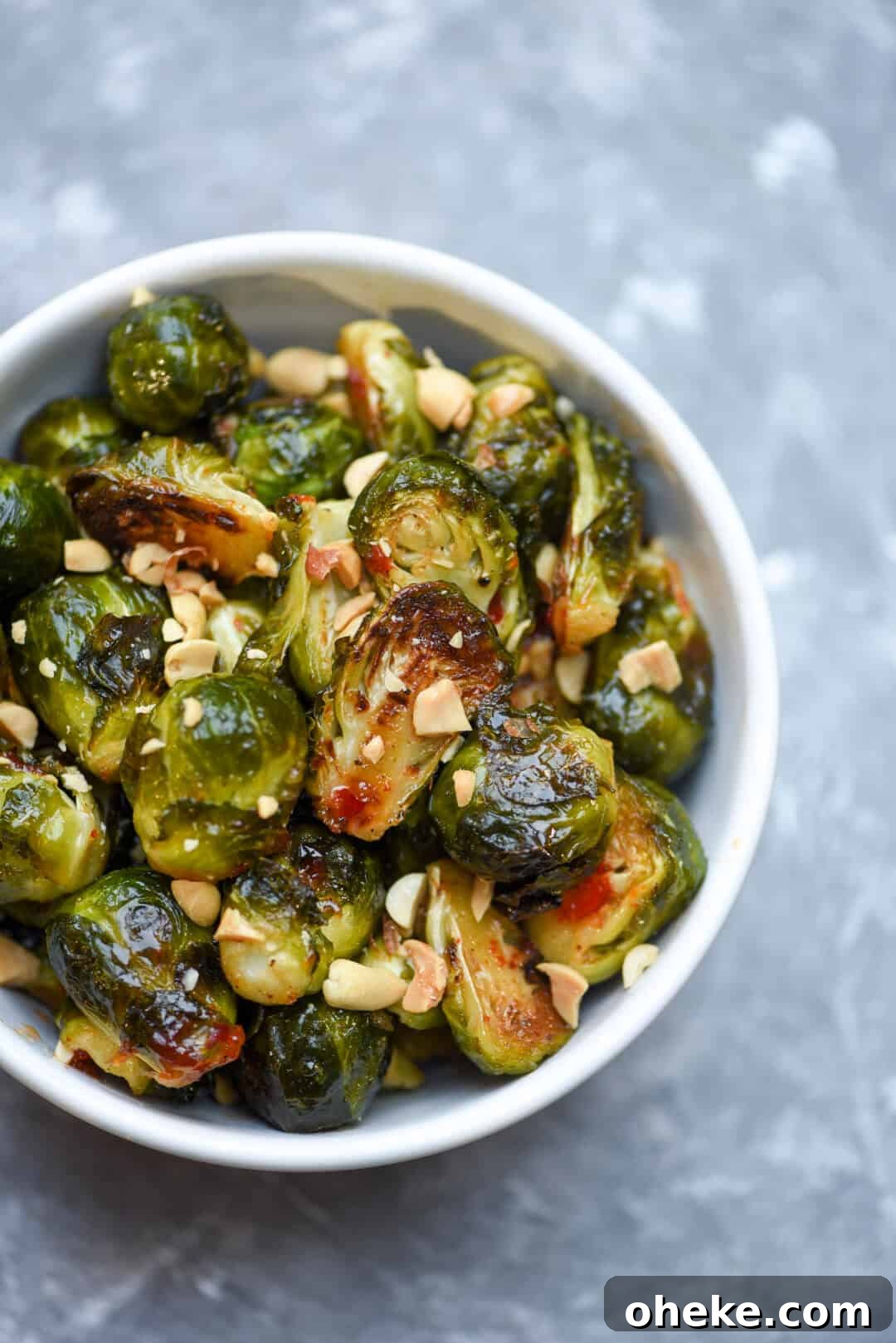 The Brussels Sprouts in a small white bowl shot from over the top.
