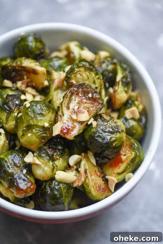 A bowl filled with Sweet Chili Roasted Brussels Sprouts.