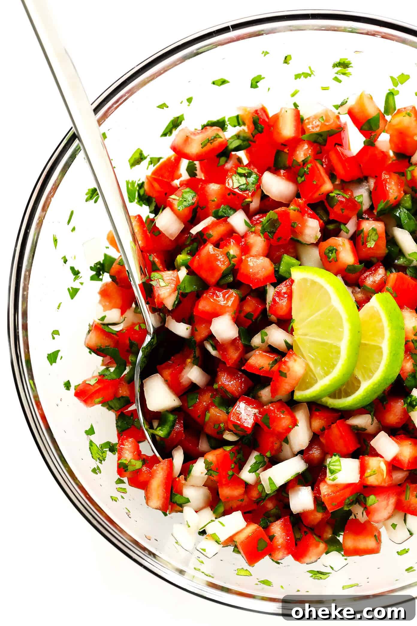 The BEST Pico de Gallo recipe! It's easy to make in 10 minutes with just 7 ingredients, it's perfect for topping all of your favorite Mexican dishes, or eating simply as salsa with chips. It's also naturally gluten-free and vegan, and perfect for Cinco de Mayo. | Gimme Some Oven #picodegallo #mexican #salsa #glutenfree #appetizer #vegan The BEST Pico de Gallo Recipe