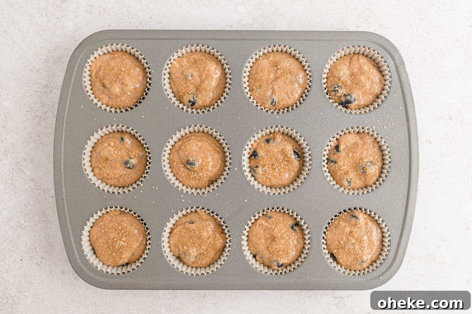 Moist Blueberry Bran Muffins with Honey and Cinnamon 9 Muffins before being baked.