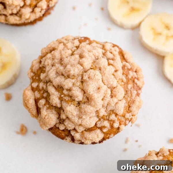 Moist Blueberry Bran Muffins with Honey and Cinnamon 13 Overhead view of a banana muffin with streusel.