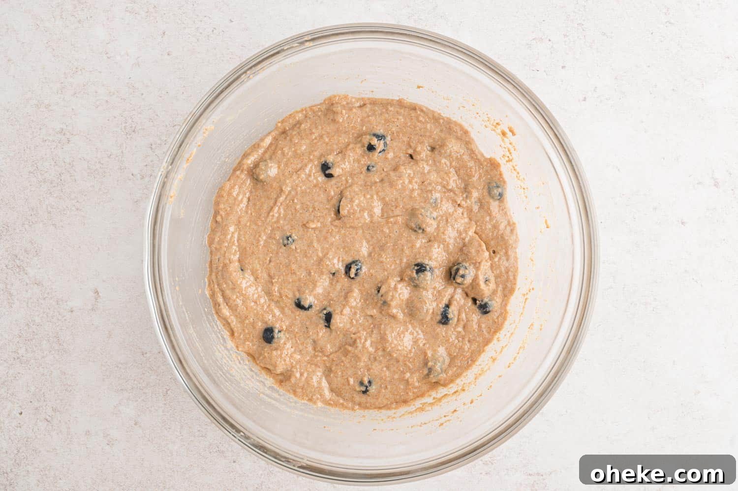 Moist Blueberry Bran Muffins with Honey and Cinnamon 8 Blueberry bran muffin batter.