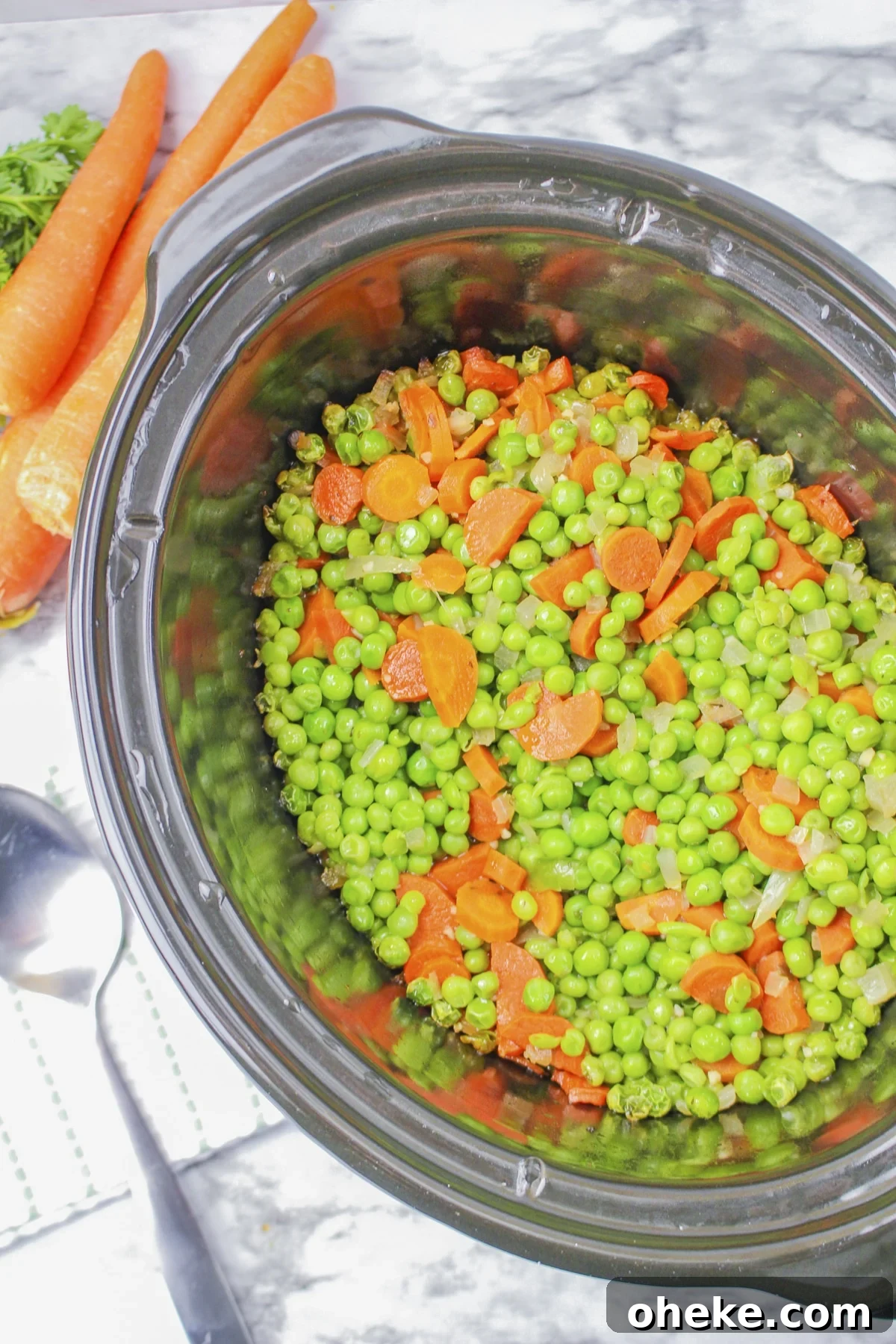 Peas and carrots cooked in the slow cooker