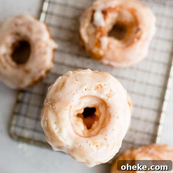 Puff Pastry Donuts on a cooling rack.
