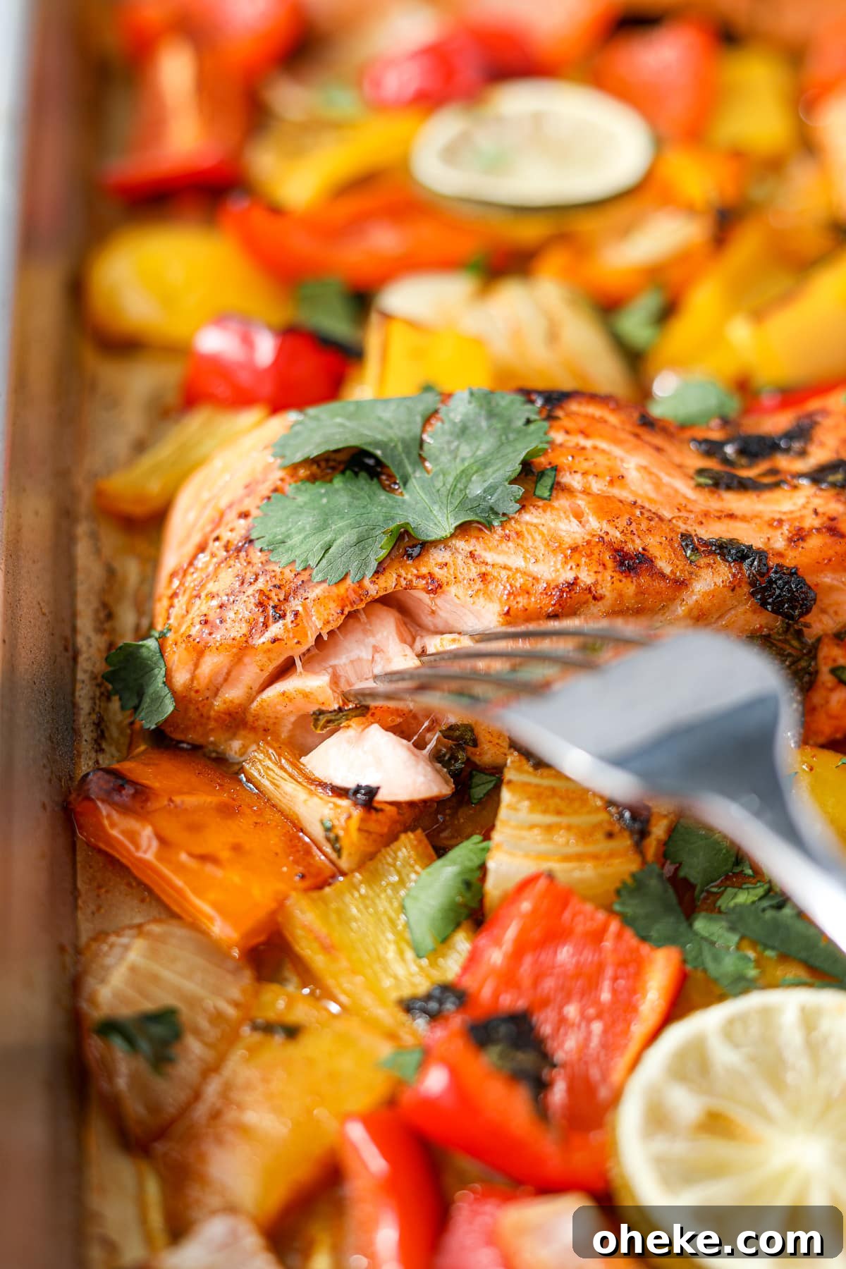 Zesty Cilantro-Lime Salmon Recipe for Quick Weeknight Dinners 8 Flaking fish with a fork.