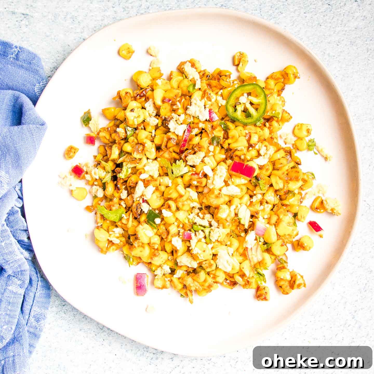 Mexican Street Corn Salad with red onions, jalapenos, cilantro and spices