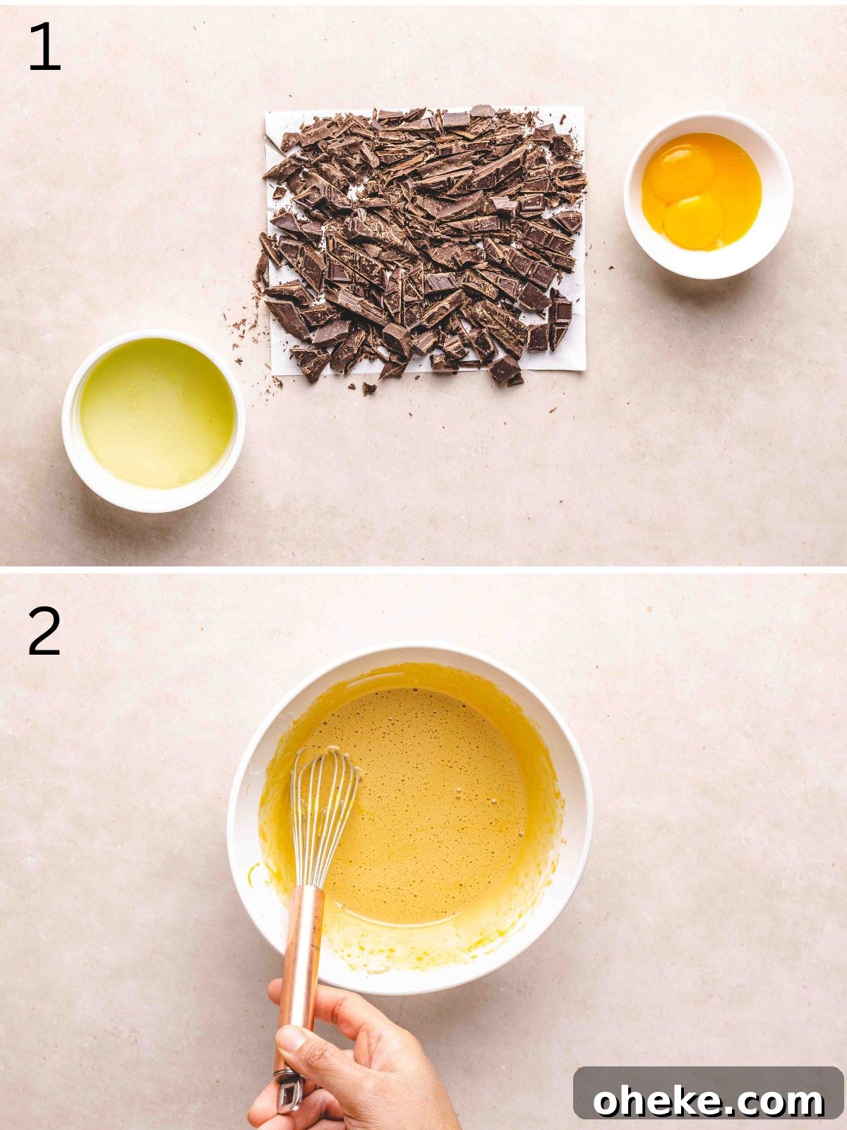 Chopped chocolate, egg whites and yolks on a flat surface.
