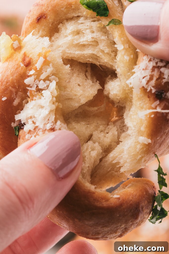 Homemade Garlic Knot Recipe: Soft, Chewy Garlic Bread Knots 3 a look at the fluffy, tender inside of a garlic knot
