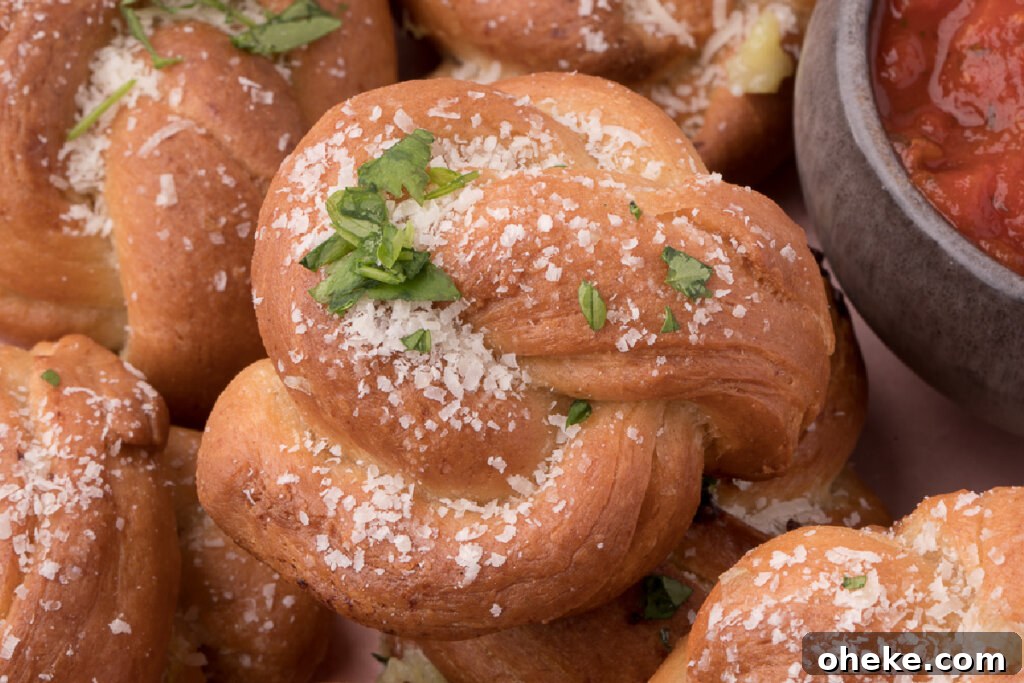 Homemade Garlic Knot Recipe: Soft, Chewy Garlic Bread Knots 5 garlic knots on serving tray
