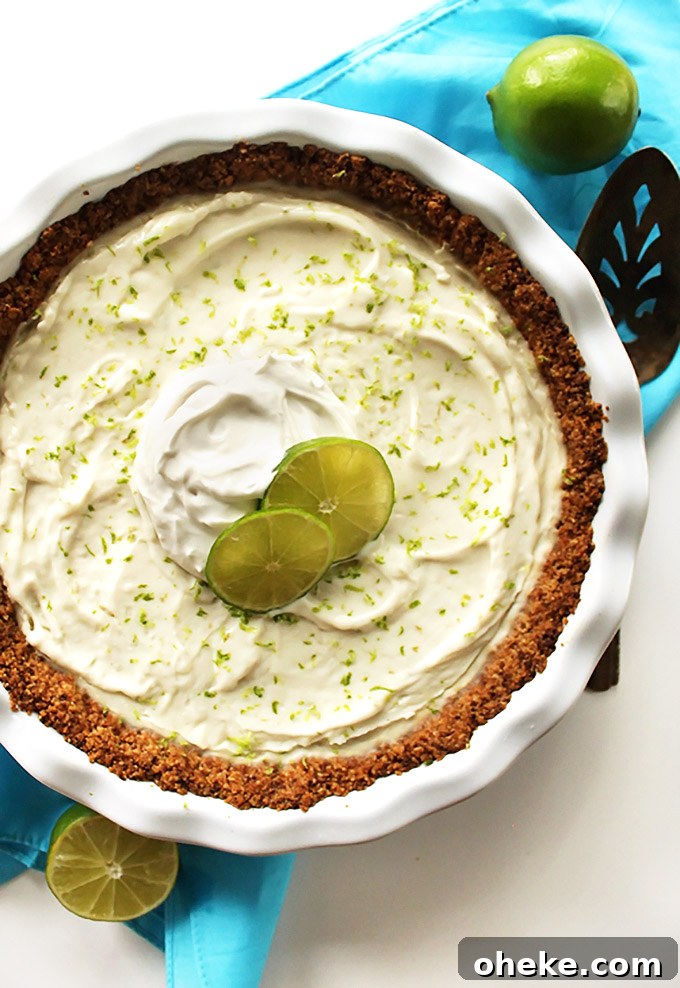 Gluten Free Key Lime Pie - Creamy filling that's sweet and tart with a simple oat and almond crust. This recipe is EASY to make. We love this dessert in the summertime! Vegan/Gluten Free/ refined sugar free.