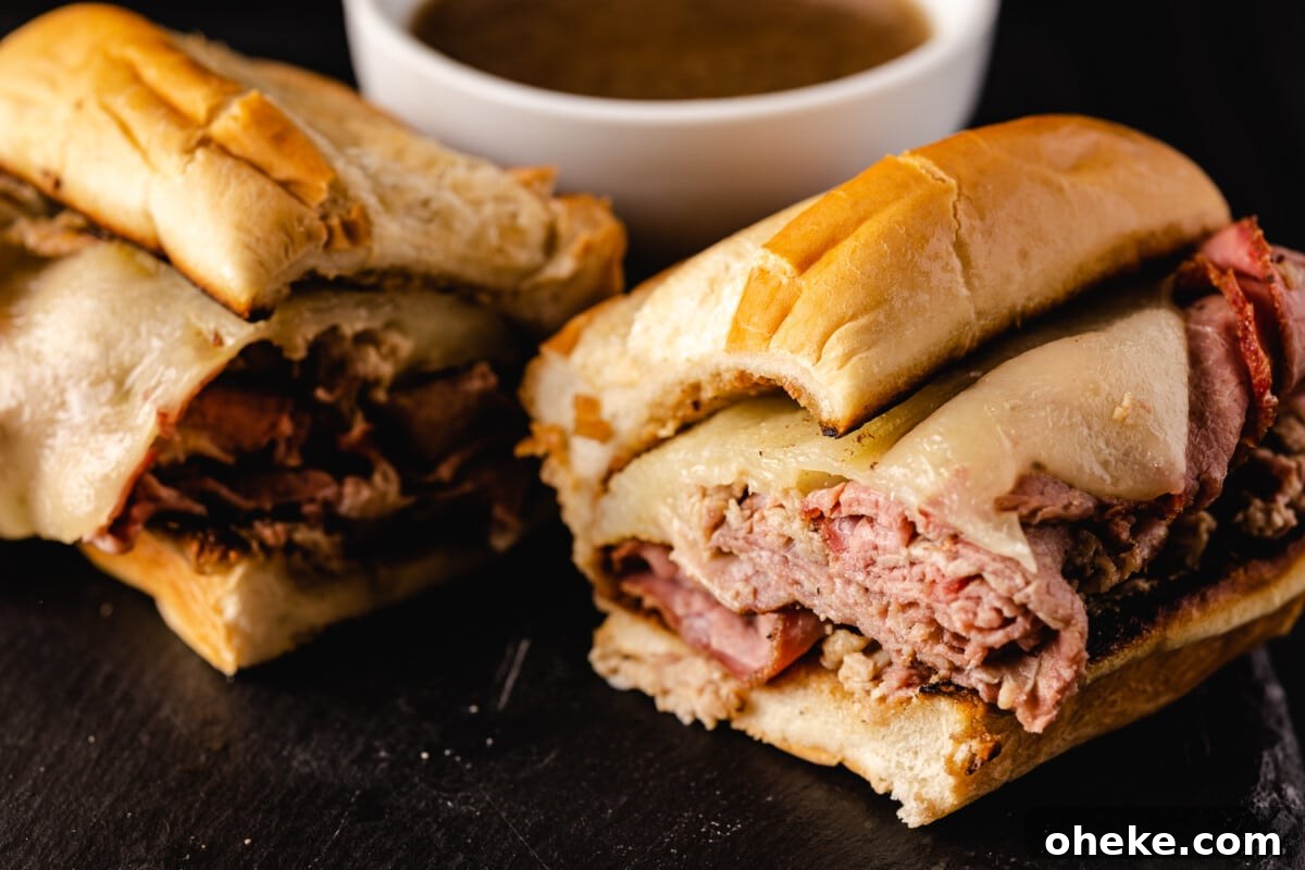 How to Store, Reheat, and Repurpose BBQ Leftovers 12 Smoked French dip sandwich next to a bowl of au jus.