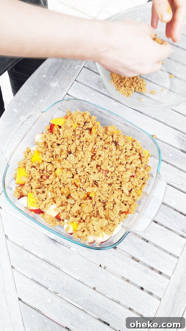 Peach nectarine mango crumble. Easy, healthy, dessert recipe that everyone will love - even kids who don't like fruit!