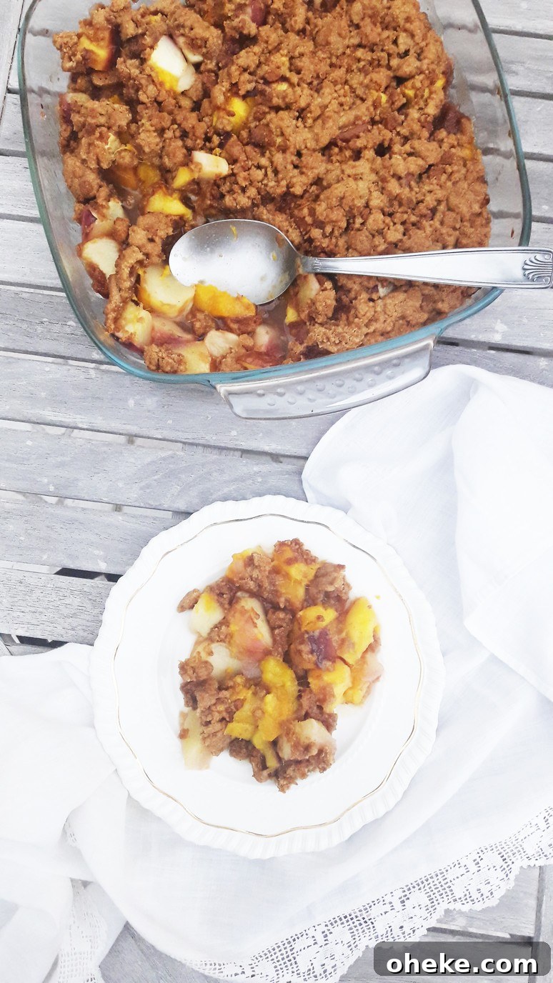 Peach nectarine mango crumble. Easy, healthy, dessert recipe that everyone will love - even kids who don't like fruit!